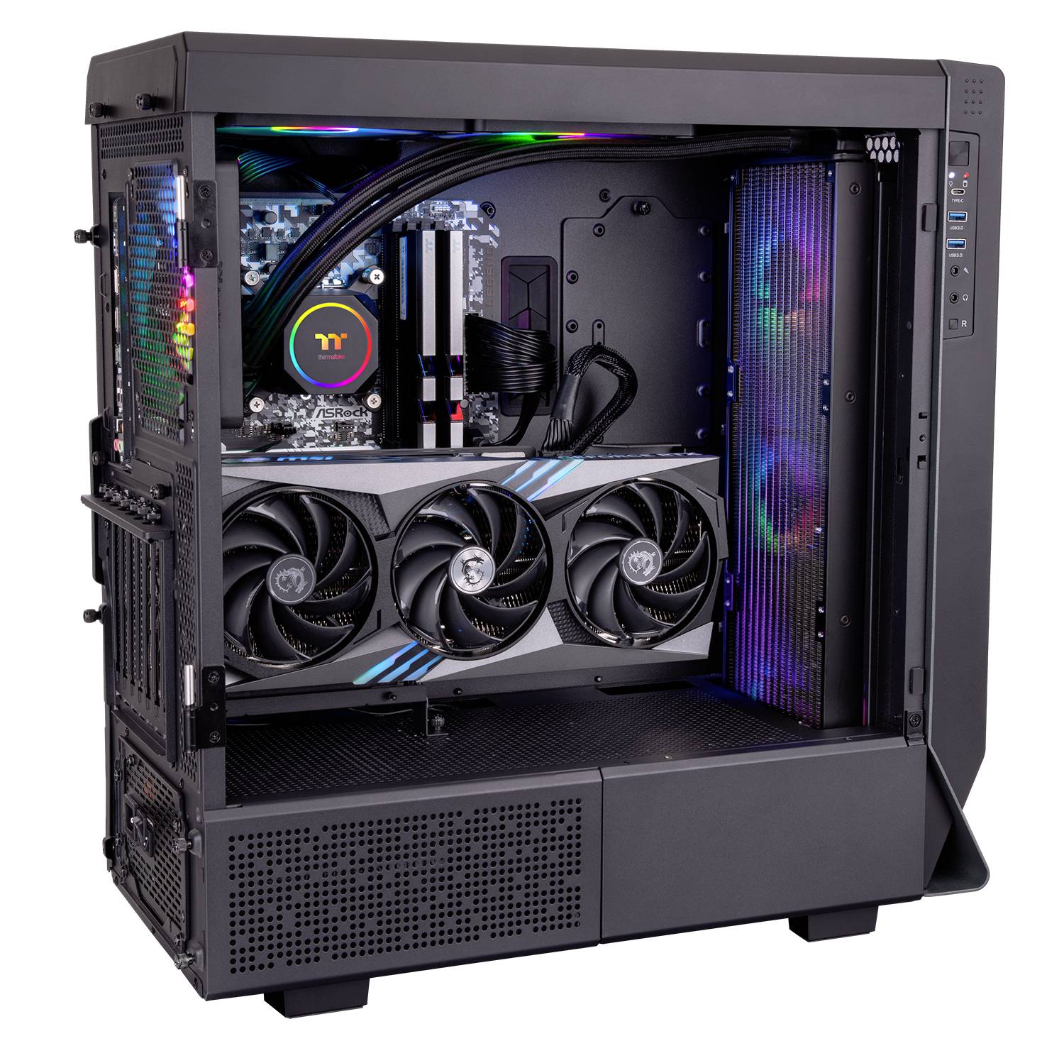 An open computer reveals its internal hardware: a graphics card, fans, and colourful LED lighting within a black case.