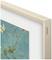 The image shows part of a framed painting with a blue background and floral motif. The frame is beige, labelled with 'Samsung'.