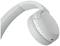 White wireless headphones with control buttons on the side of the earpiece, suitable for listening to music or making phone calls.