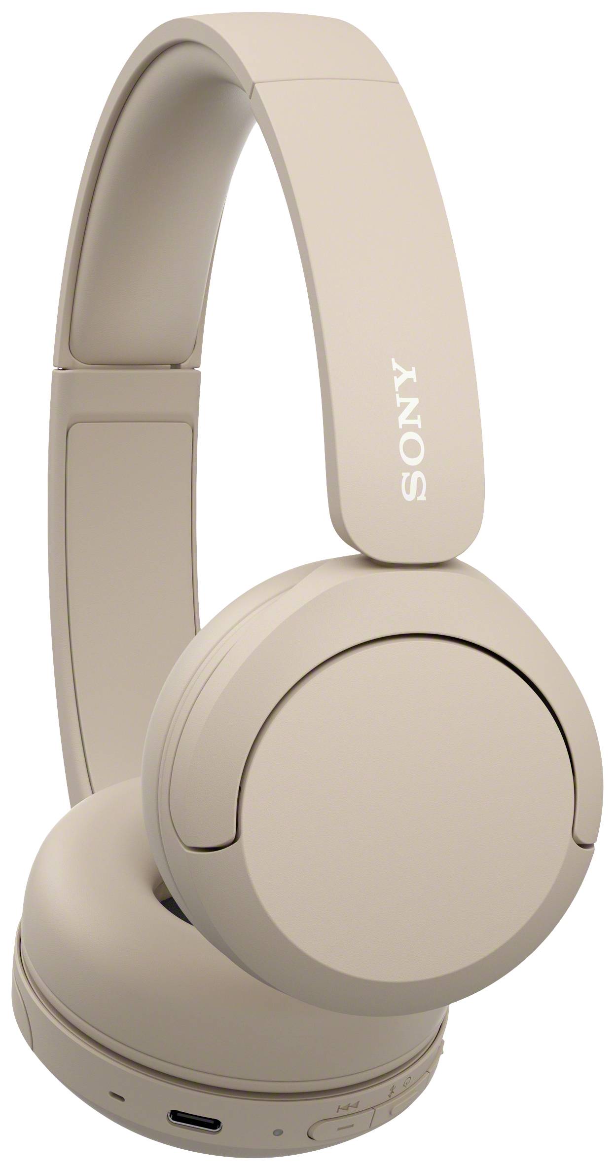 Beige wireless headphones by Sony, closed-back design, suitable for music enjoyment and calls.