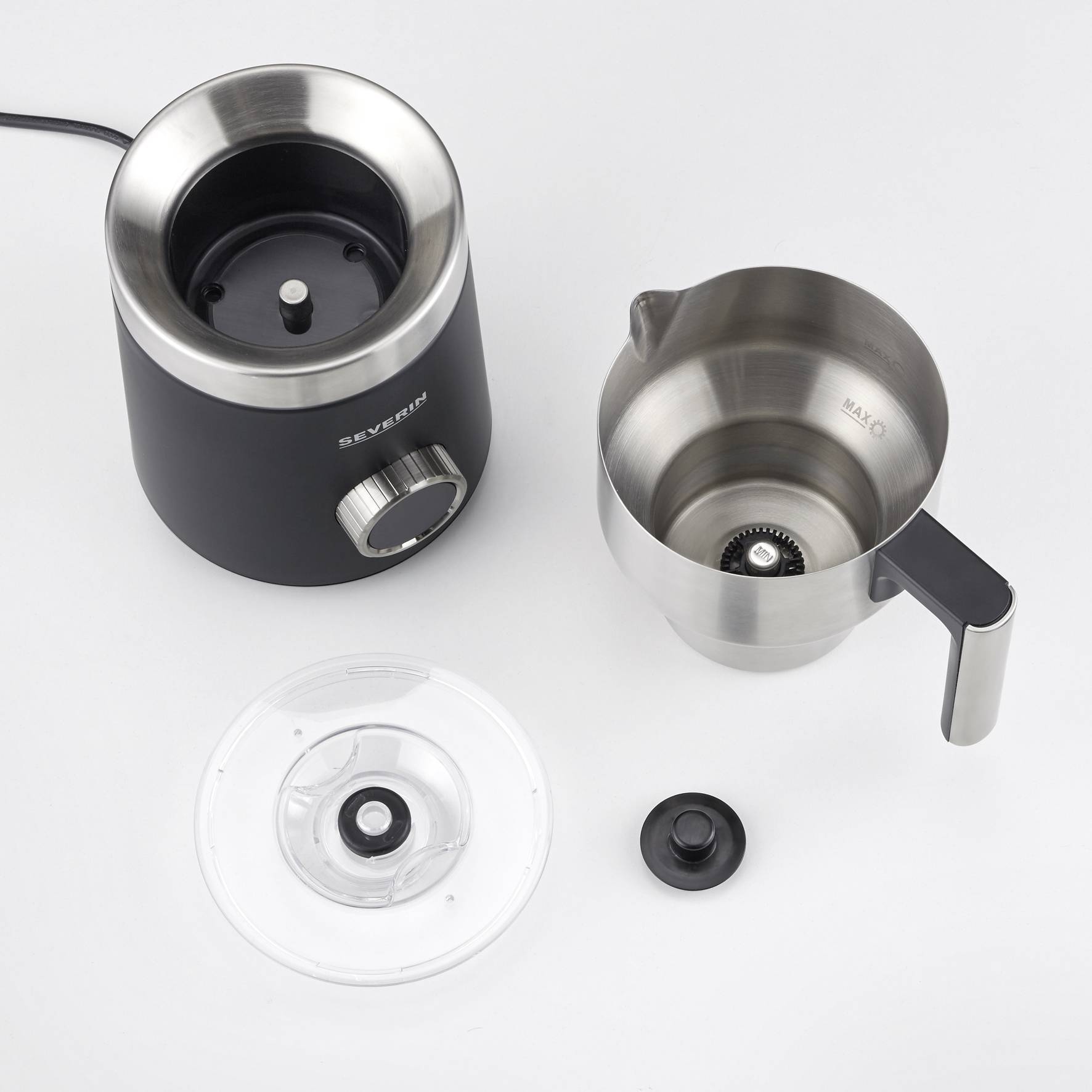 Electric milk frother with removed lid and stainless steel container. Shown are the jug, lid, and spiral whisk.