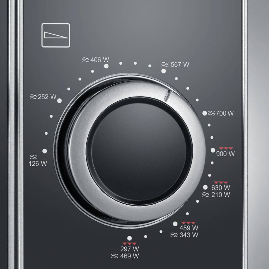 'Black rotary dial of a microwave oven with wattage indicators from 126 W to 900 W, symbols for various cooking levels around the dial.'