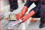 Electrician's protective glove with mechanical and thermal protection, size 12, class 00, red