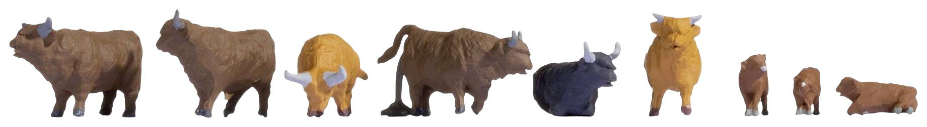 Various plastic figurines of cattle, bulls, and cows in different sizes and colours stand side by side.