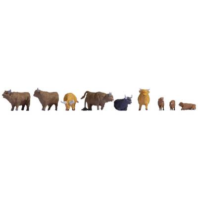 Various plastic figurines of cattle, bulls, and cows in different sizes and colours stand side by side.