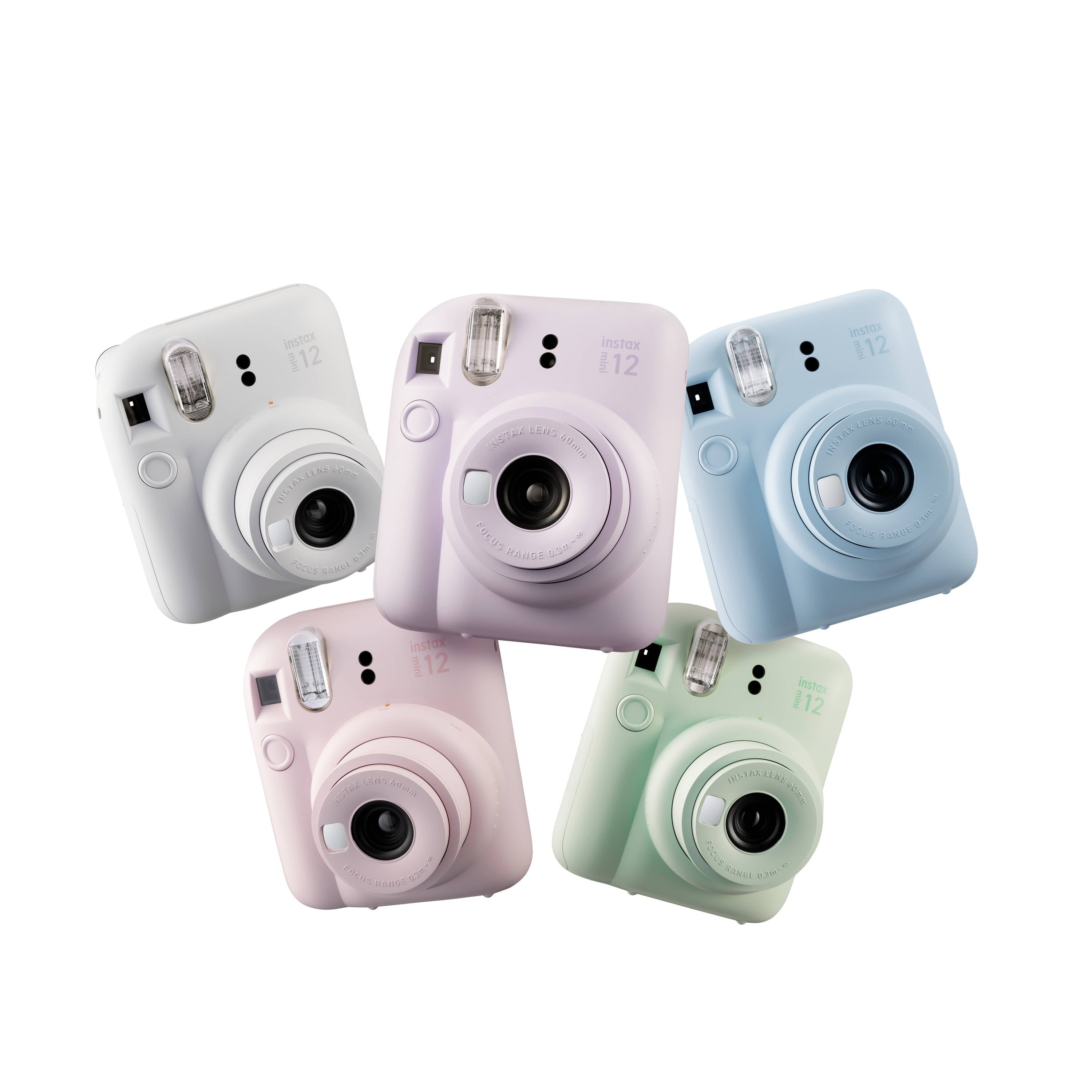 Five colourful instant cameras in white, pink, light blue, and light green are arranged in a circle. They have a nostalgic design.