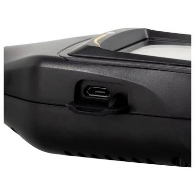 Close-up of a black device casing showing a recessed micro-USB charging port on the side.<br>