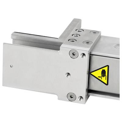 Close-up of a metal machine guard with a yellow pinch hazard warning symbol on the side.<br>