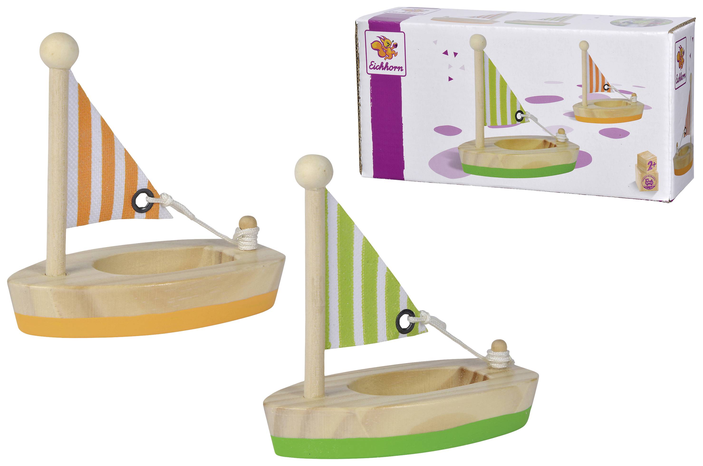 Two colourful wooden sailing boats with striped sails; one orange, the other green. Packaging in the background shows the same design.