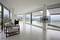 A bright, modern room with large windows offers a view of a picturesque landscape. Two white armchairs are positioned on the left side of the room.