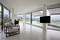 A contemporary, spacious living area with large windows and a view of an expansive landscape. A black television is mounted on the wall to the right.