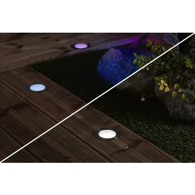 Wooden decking by day and night, illuminated by round, built-in LED lights; colours range from white to violet.