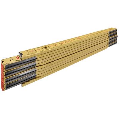 A yellow wooden ruler spread out on a surface shows the measurement divisions in centimetres.