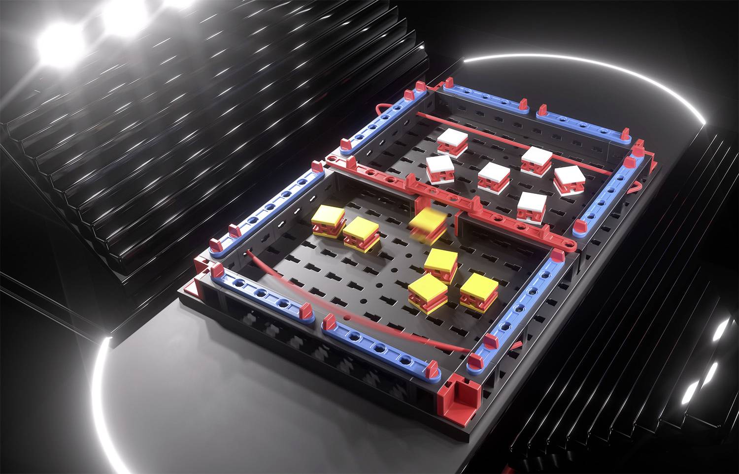 A black and grey game board with colourful blocks in red, yellow, and white, arranged in a rectangular grid with blue and red boundaries.