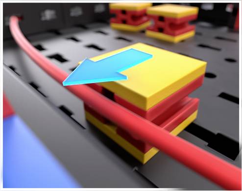 A red cable runs over a yellow square connector with red layers. A blue arrow points to the connector.