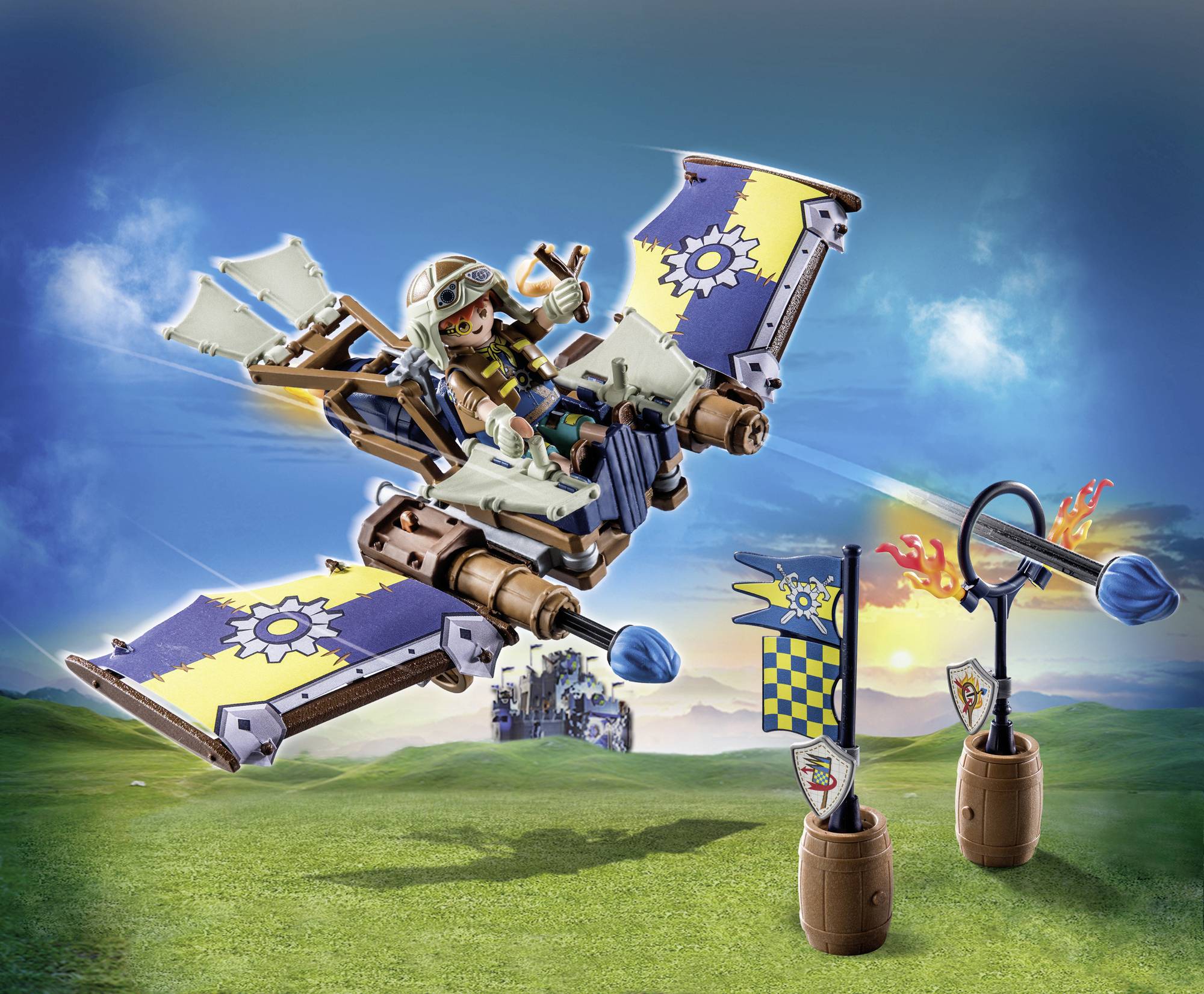 A toy aeroplane with a small pilot flies in a fantasy landscape. Flags and barrels are visible in the foreground.