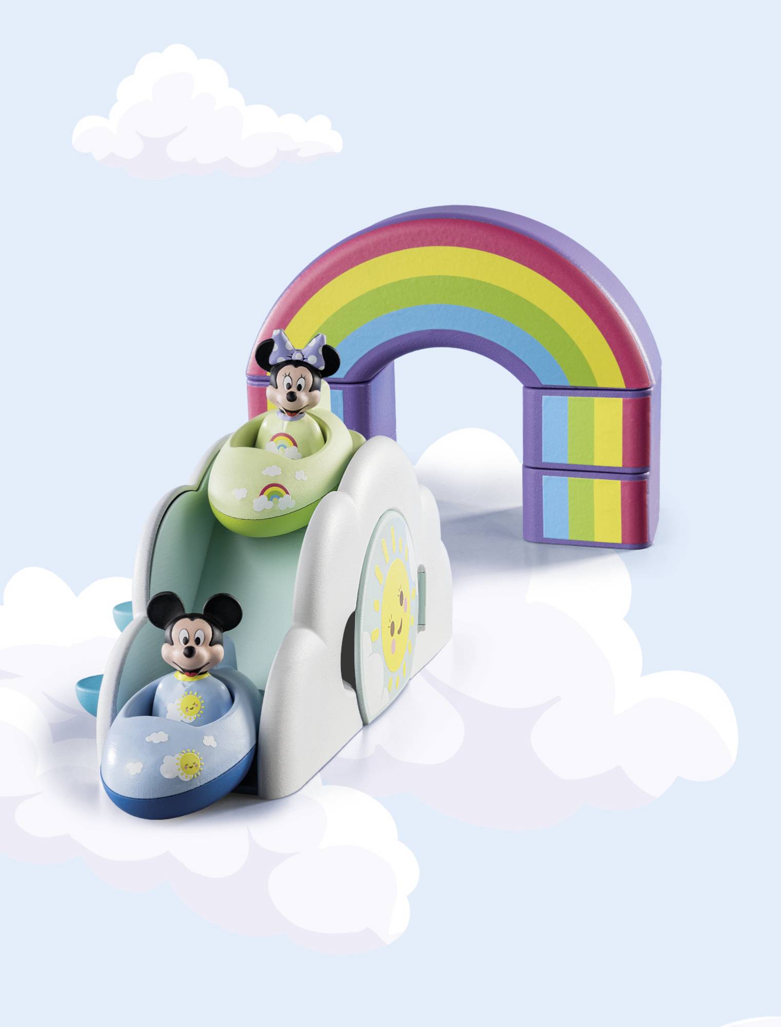 Two toy cars with well-known mouse characters slide down a slide. A rainbow arch in the background on a cloudy surface.