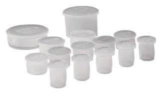 Several small, transparent plastic containers with lids in various sizes, grouped side by side.