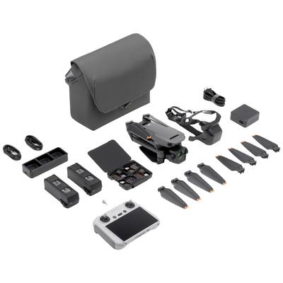 Drone kit with foldable drone, remote control, batteries, propellers, chargers, cables, and carrying case on white background.
