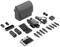 Drone kit with foldable drone, remote control, batteries, propellers, chargers, cables, and carrying case on white background.