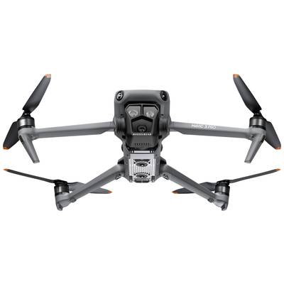 Drone view of Mavic 3 Pro with four rotors and camera. The drone is positioned in the air, showing its underside with electronic modules.
