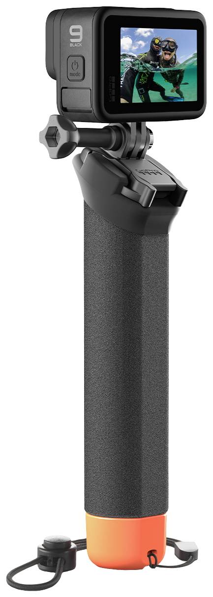 A camera on a handheld tripod shows an image of a diver underwater on its display.