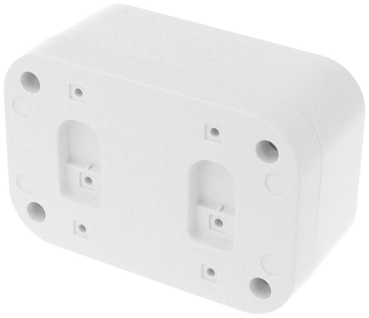 White, rectangular plastic box with rounded corners and multiple mounting holes on the visible surface.
