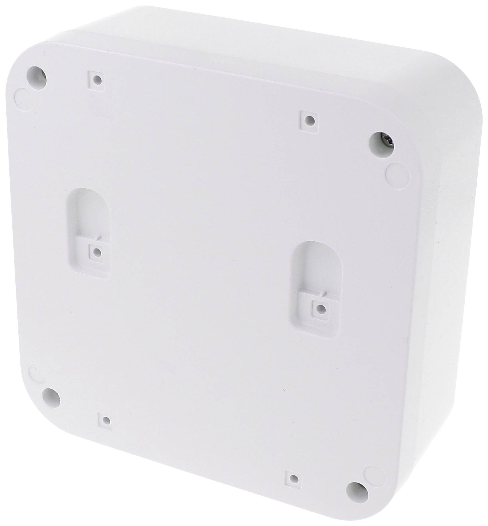 A white, square plastic enclosure with rounded corners and four mounting holes, displays a smooth surface.