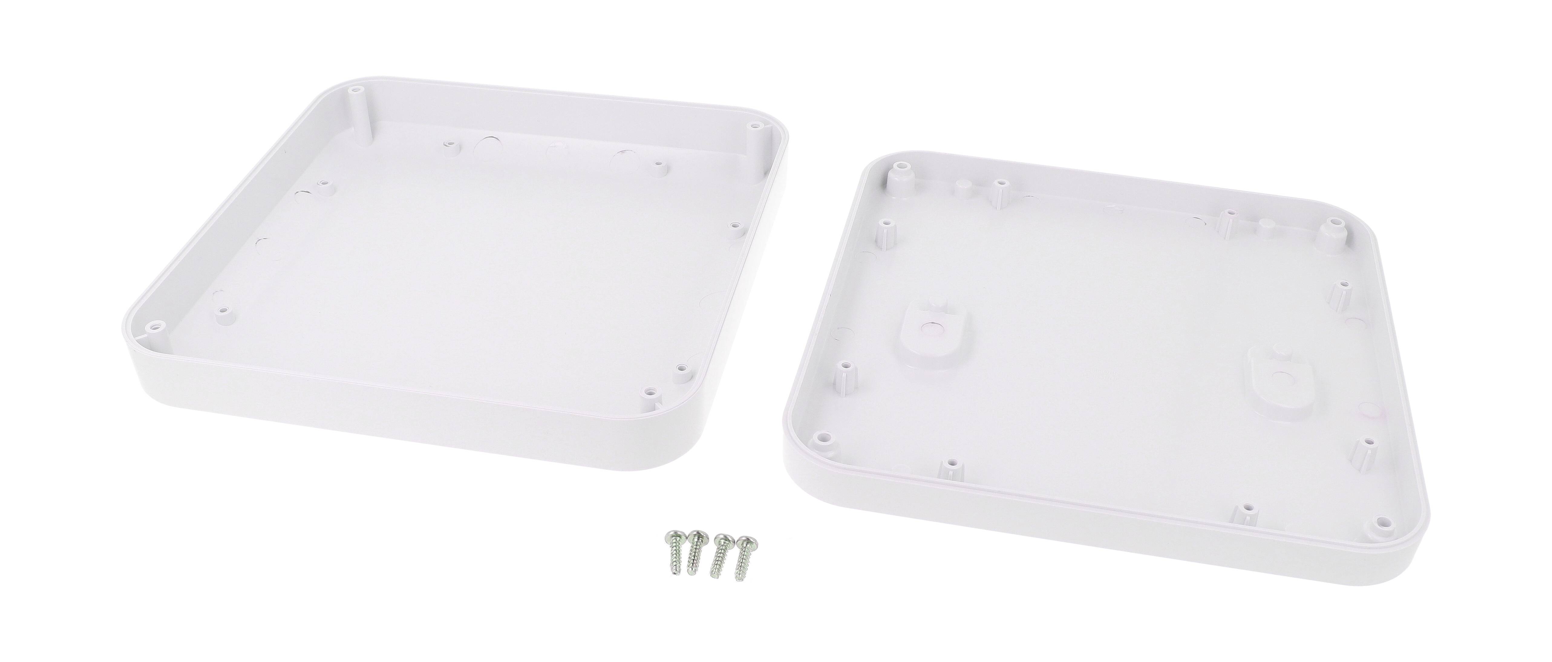 Two square plastic housing halves lie side by side, with accompanying screws in the centre. Suitable for electronic assembly.