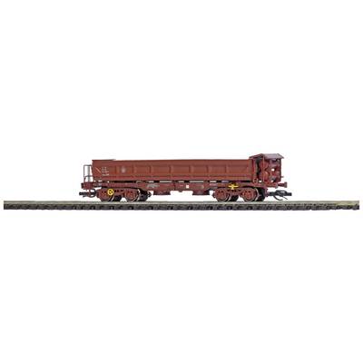 A brown goods wagon on a railway track, side view. The wagon has yellow and white markings and looks well-used.