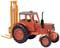 An orange toy tractor with a grey roof and a small forklift attachment at the front.