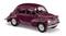 A model car in dark red, styled after a classic design with rounded forms and visible bodywork details.