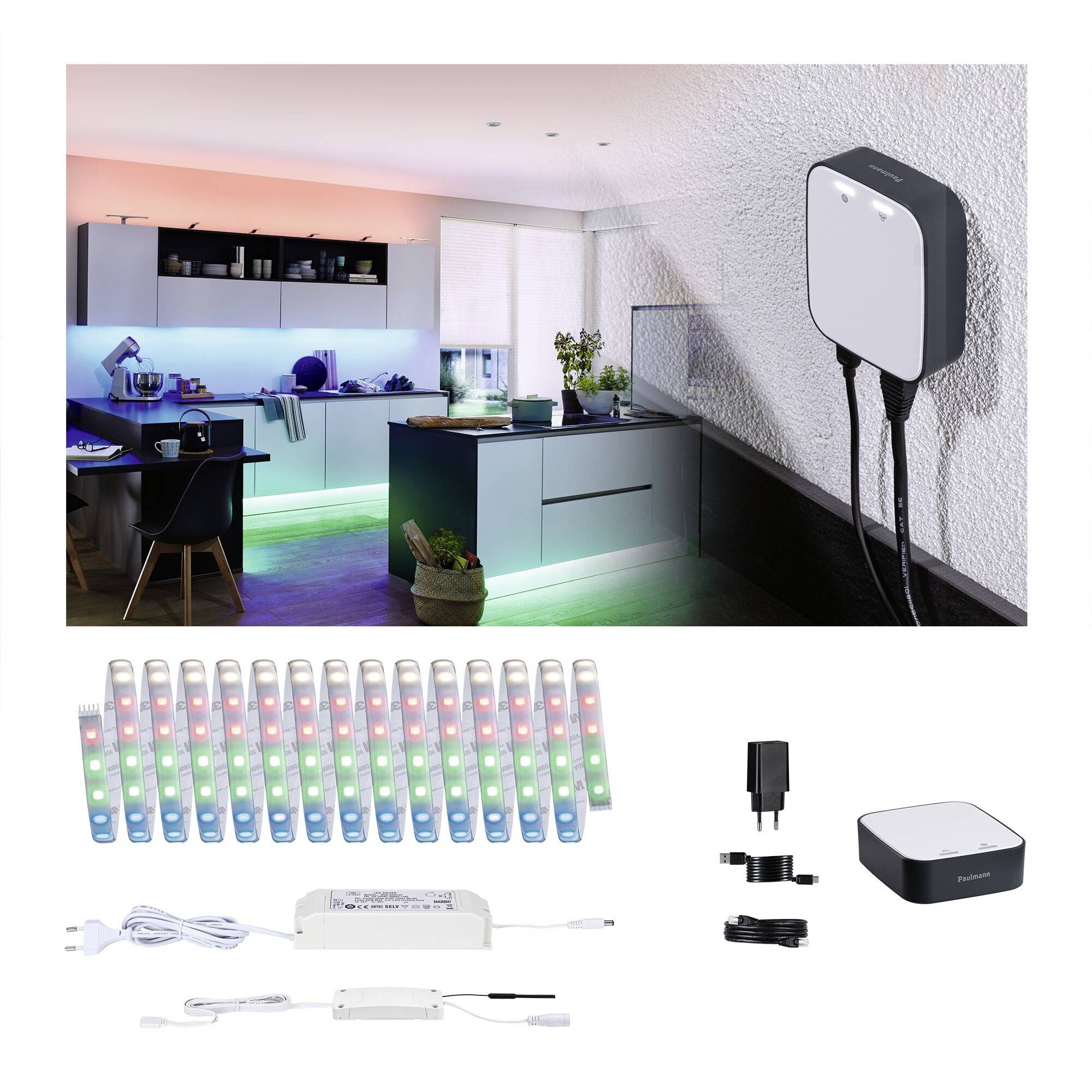 Several coloured LED light strips and accessories. In the background, a kitchen with LED lighting underneath shelves and furniture.