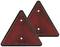 Two red triangular reflectors, each with a hole, used for traffic warning purposes.