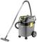 Industrial vacuum cleaner in grey with a black handle and yellow details on wheels. Suitable for heavy-duty cleaning tasks.