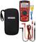 A red digital multimeter by Benning with accessories: test leads, thermocouple, adapter and black carrying case.