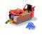 Toy pirate ship with race track and green car. A blue octopus sits beside it. Colourful, child-friendly design.