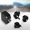 A black LogiLink charger with interchangeable plugs for US, UK, AU and EU positioned in front of a road in mountainous terrain.