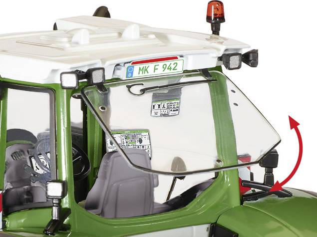 A green tractor with open doors and a raised windscreen. An orange warning light is mounted on the roof.