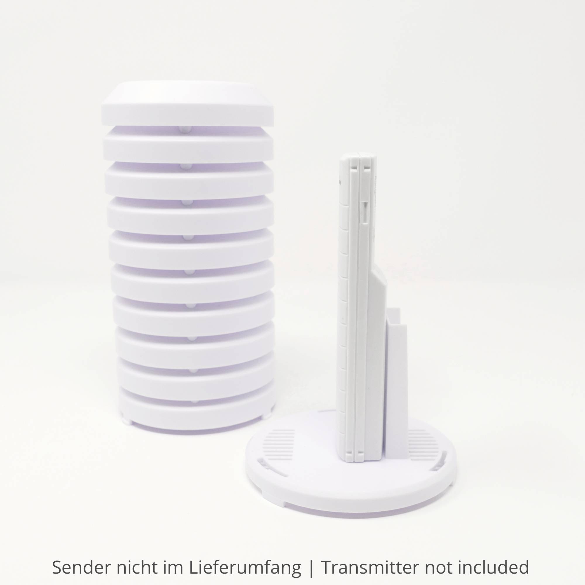 A white, stacked, cylindrical device with a slender, upright module. Note: 'Transmitter not included'.