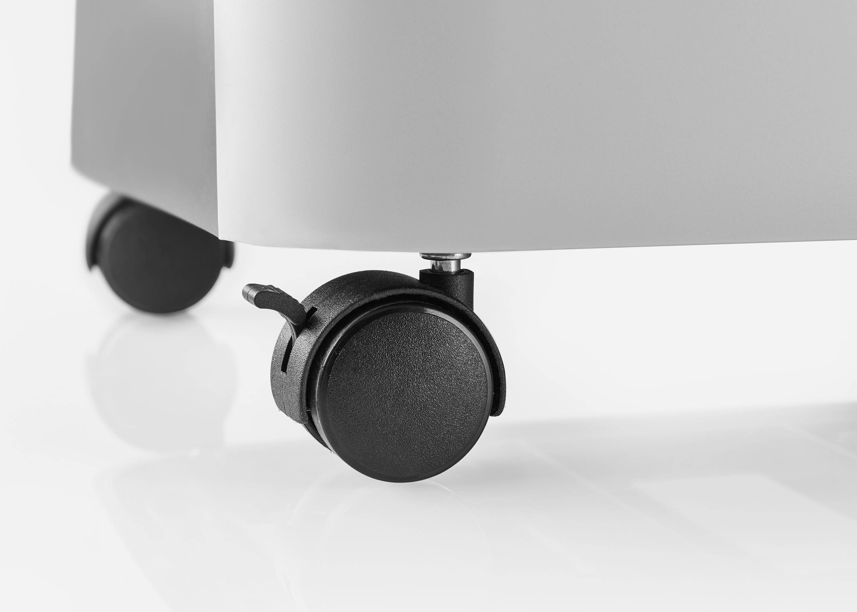 A grey piece of furniture with black castors, which is mobile and easy to move. Ideal for flexible room layout.