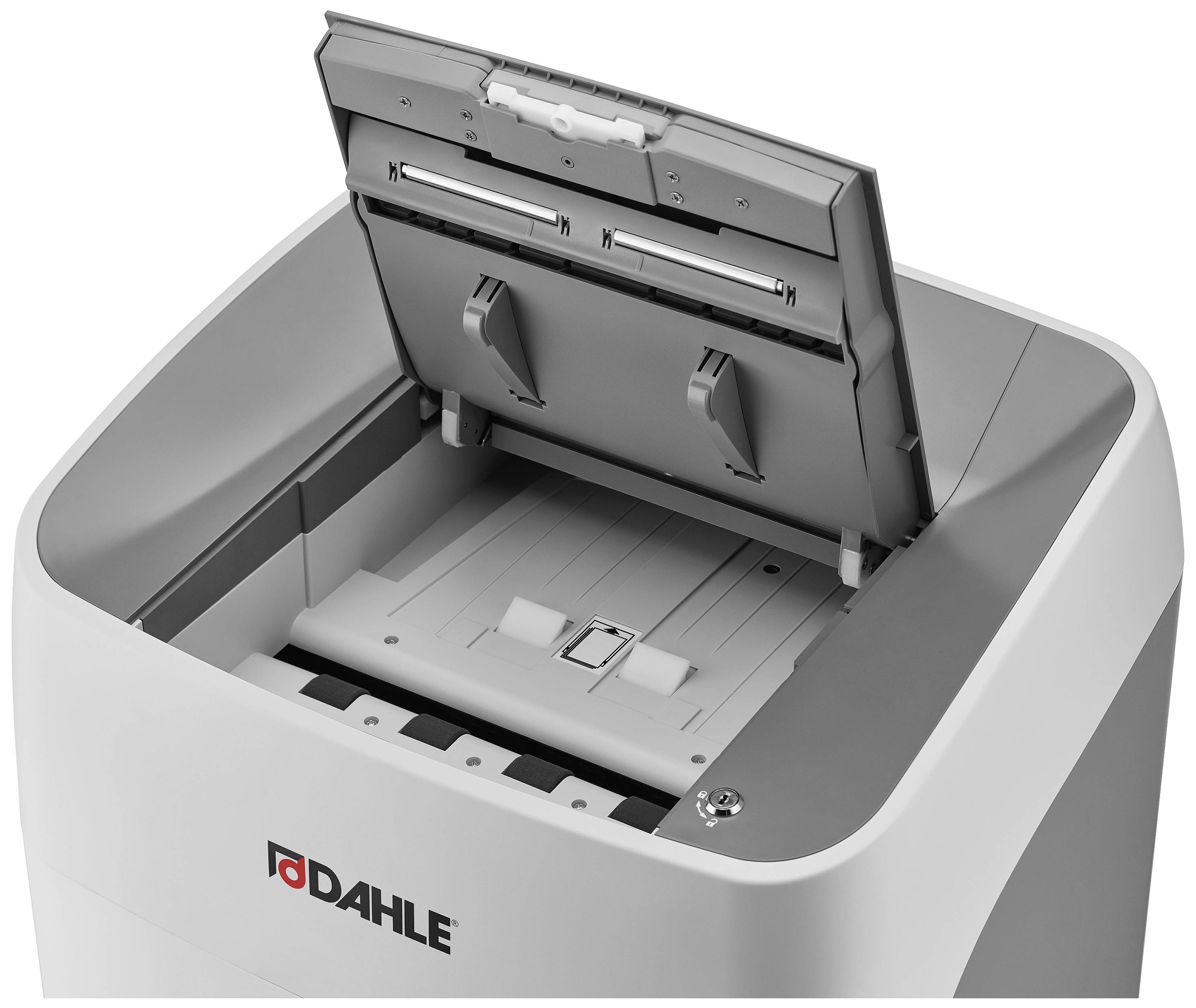 An open paper shredder with a visible input slot. The 'Dahle' logo is printed on the front.