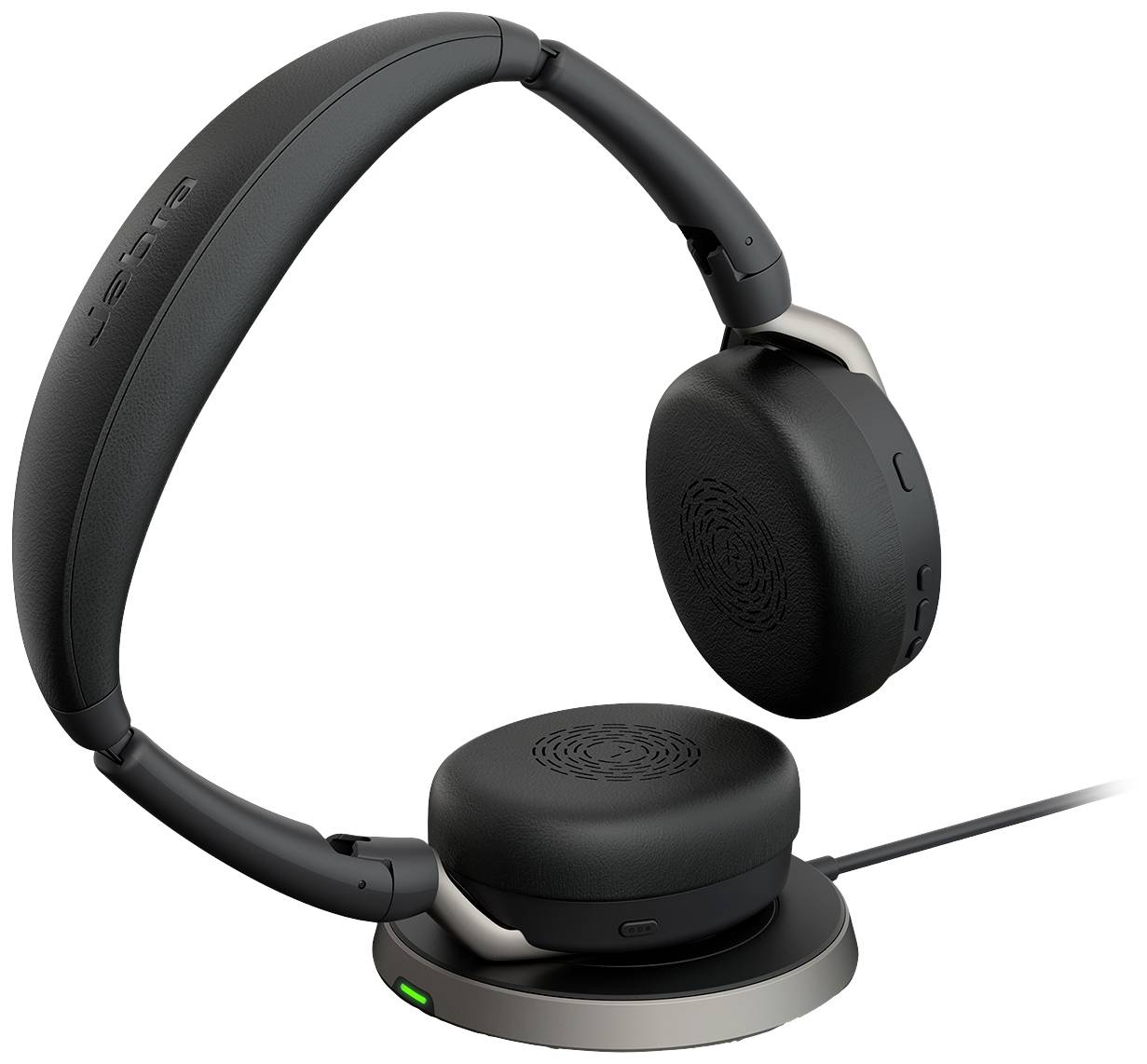 Black wireless headset on a charging station, ready for use. The ear cups are padded for comfort.