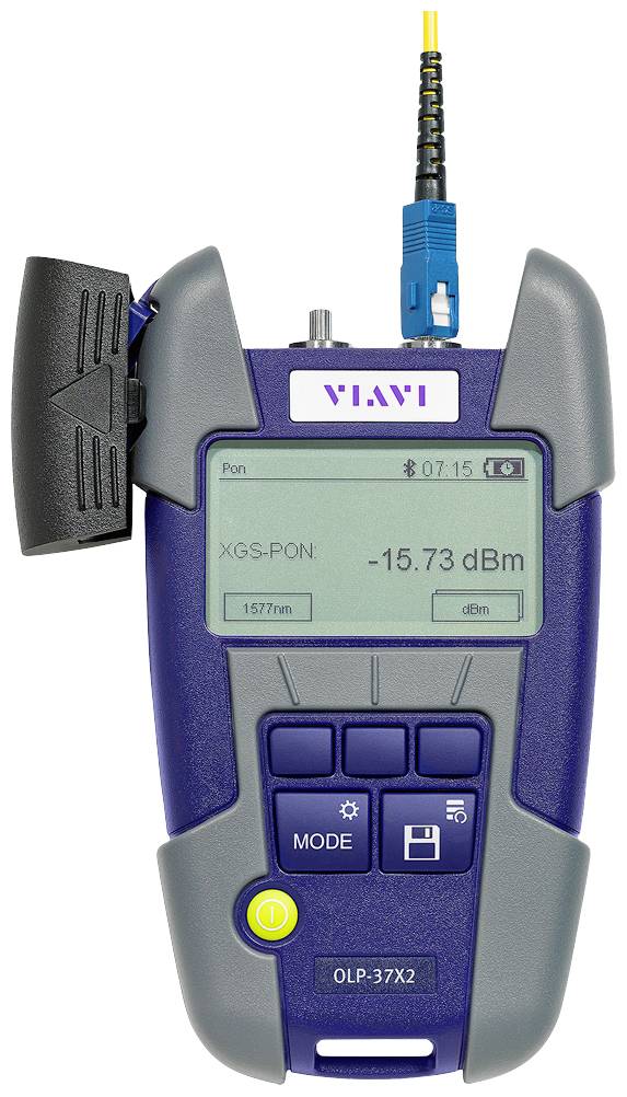 Handheld optical power meter, display showing '-15.73 dBm', fibre connected at the top, 'MODE' and 'TEST' buttons visible at the bottom.