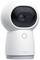 White smart surveillance camera with an oval lens and minimalist design, standing upright. Brand 'Aqara'.
