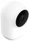 White surveillance camera with a black lens, in a modern, rounded design. Ideal for indoor security monitoring.