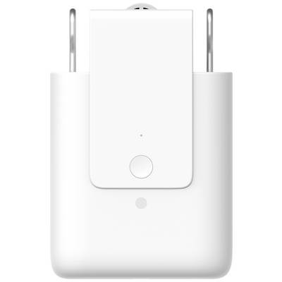 A white, rectangular charger with two plugs and a small button on the front.