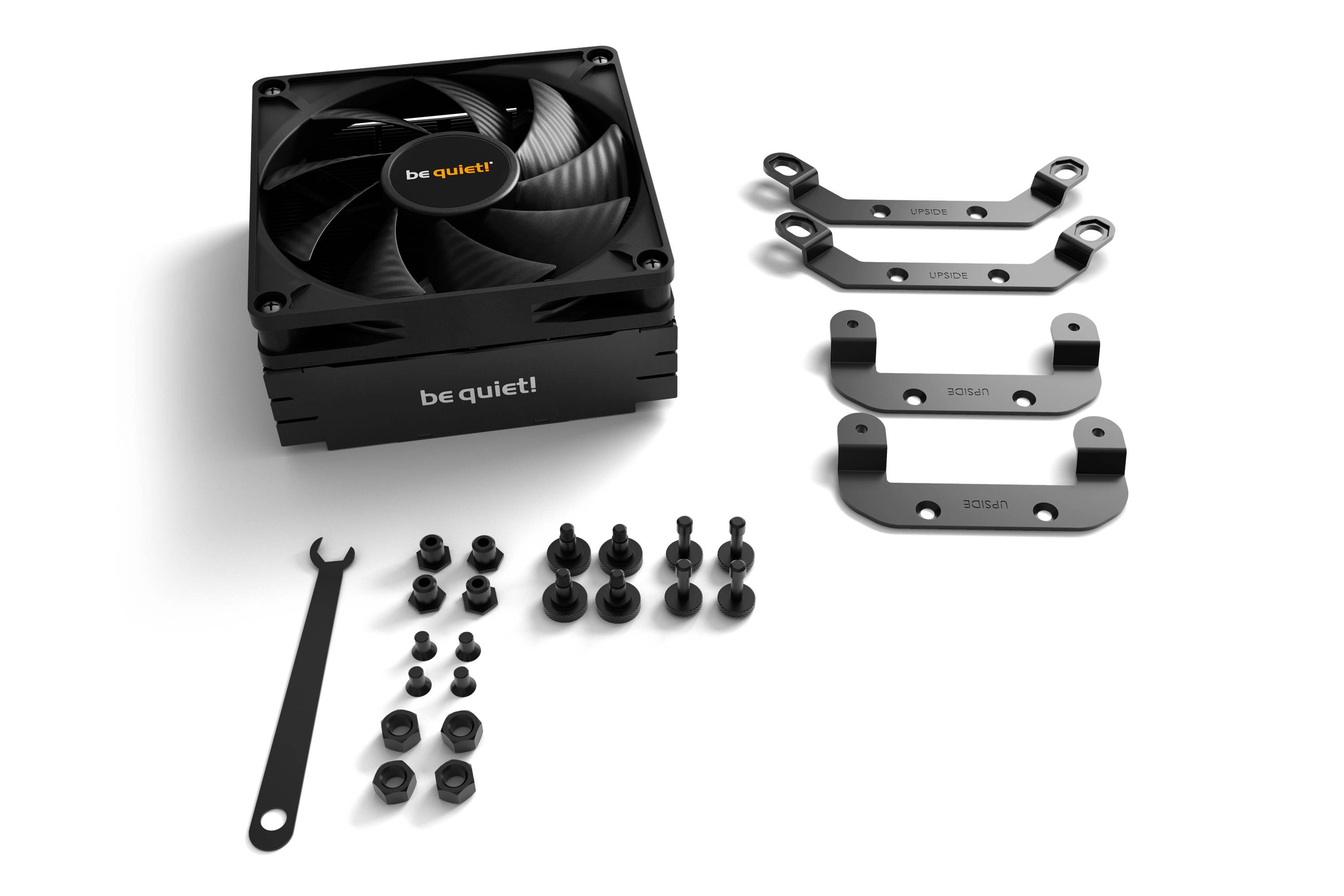 Cooler with fan, mounting rails and accessories for PC. 'be quiet!' brand clearly visible.