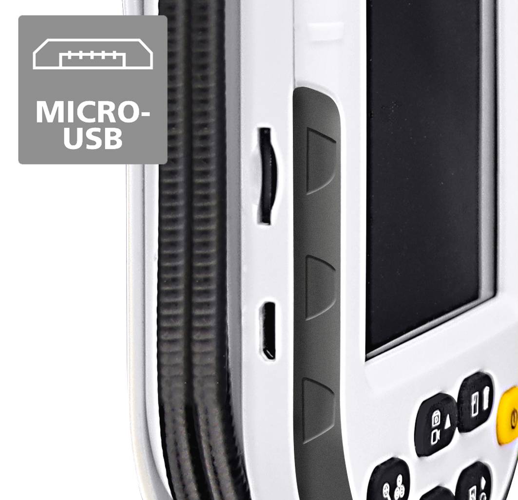 'Close-up of a device with a micro-USB port on the left side, keypad visible to the right of it.'