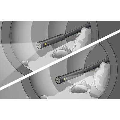 A camera is inspecting the inside of a pipe. At the top, the pipe is empty, while at the bottom, stones are blocking the passage.